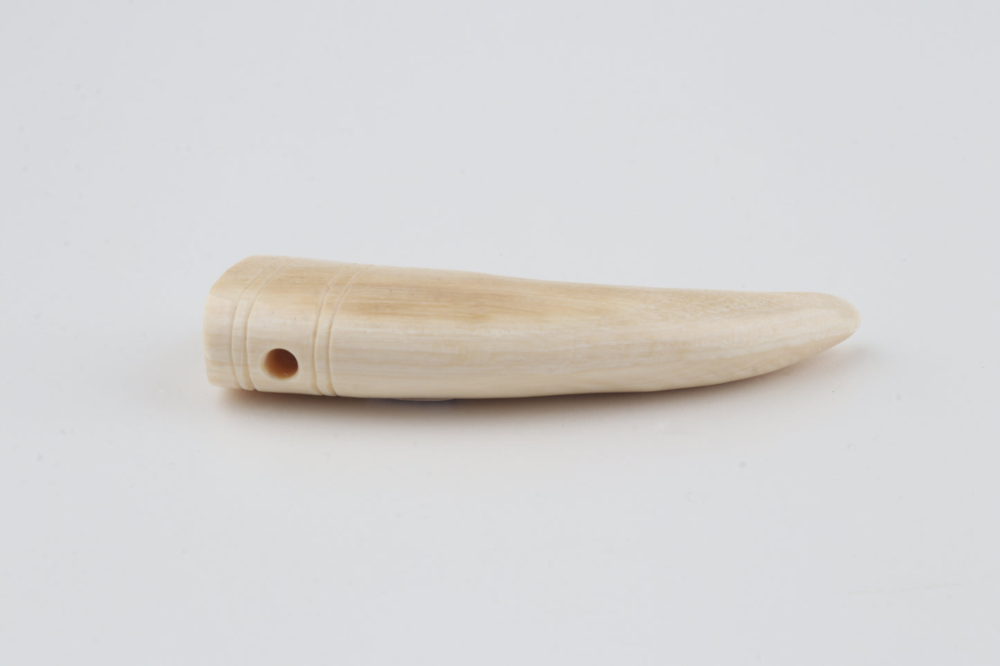 Carved mammoth ivory pendant