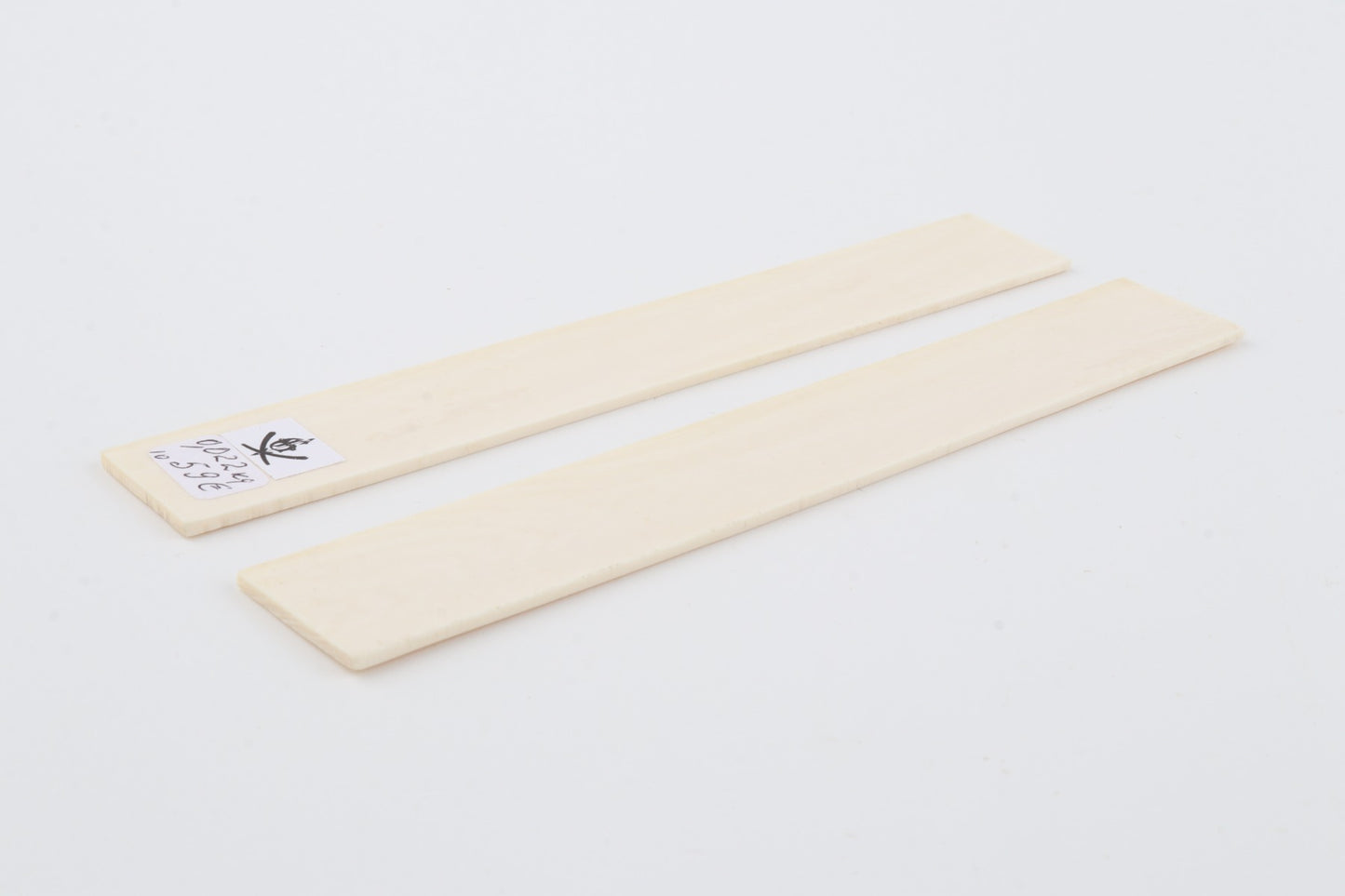 White mammoth ivory scales
