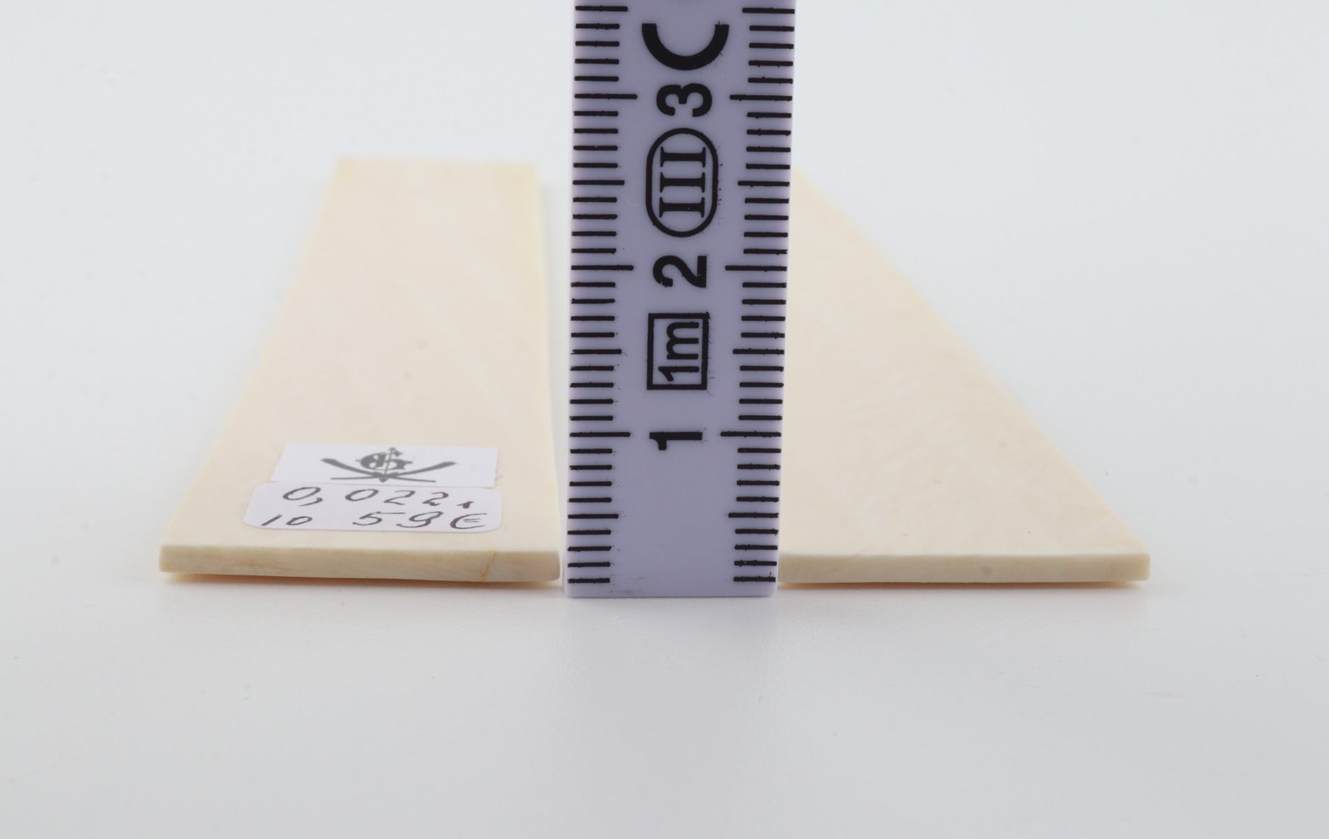 White mammoth ivory scales