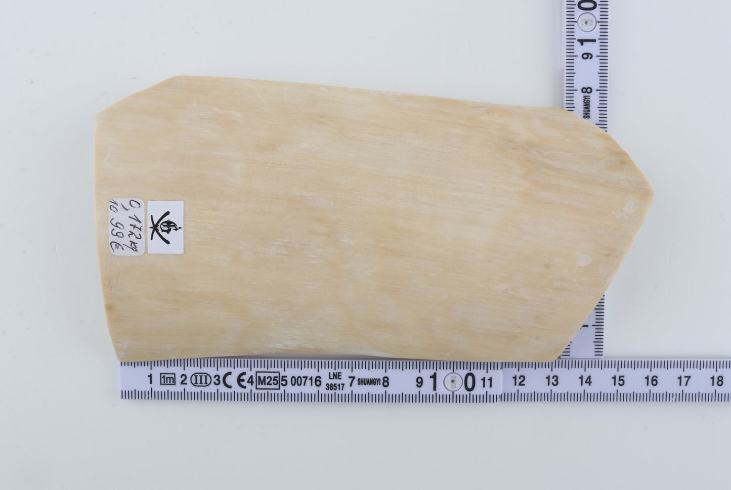 White mammoth ivory piece
