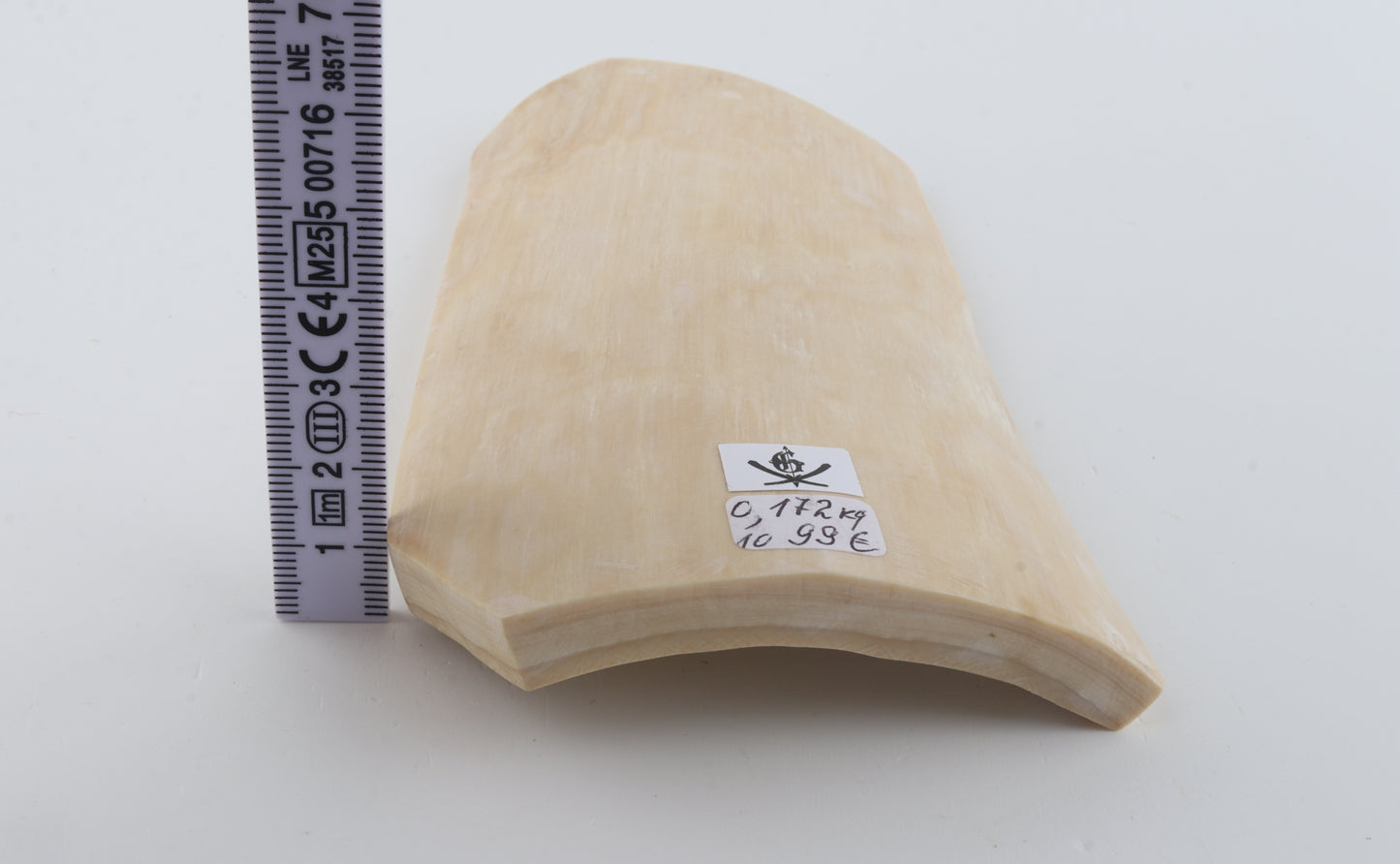 White mammoth ivory piece