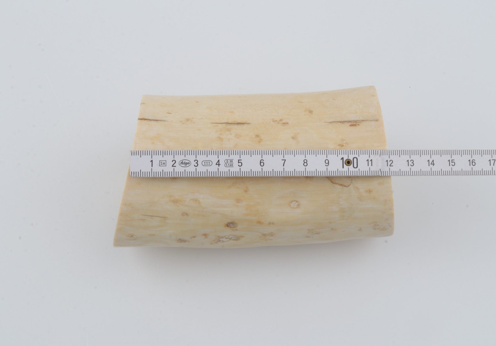 Round mammoth tusk piece
