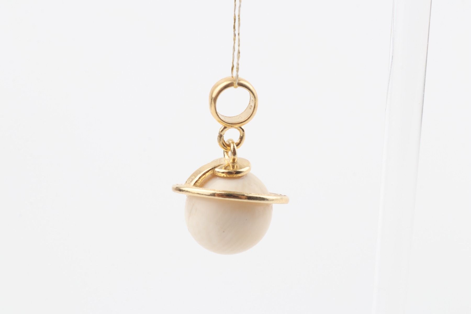 The Saturn Mammoth Ivory Pendant