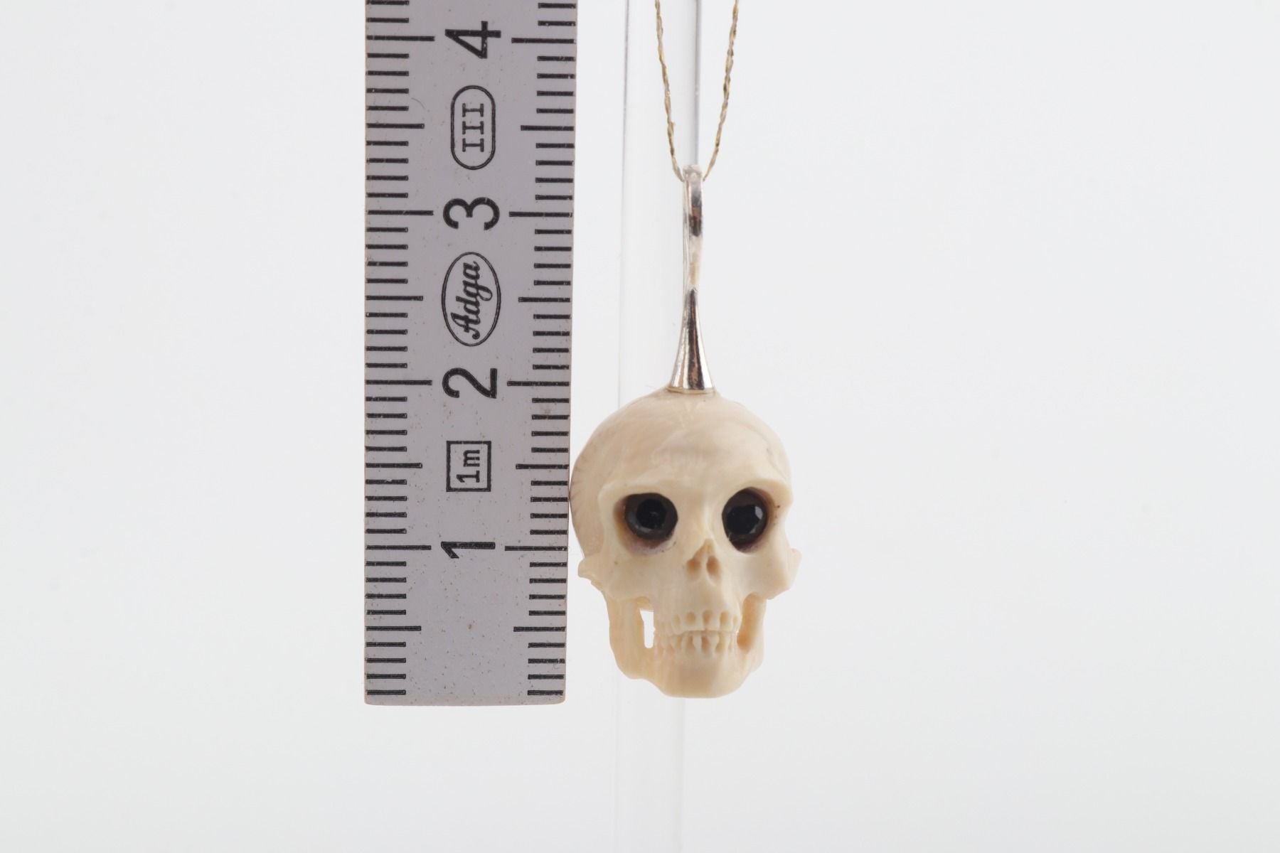 Festive Mammoth Ivory Skull Pendant