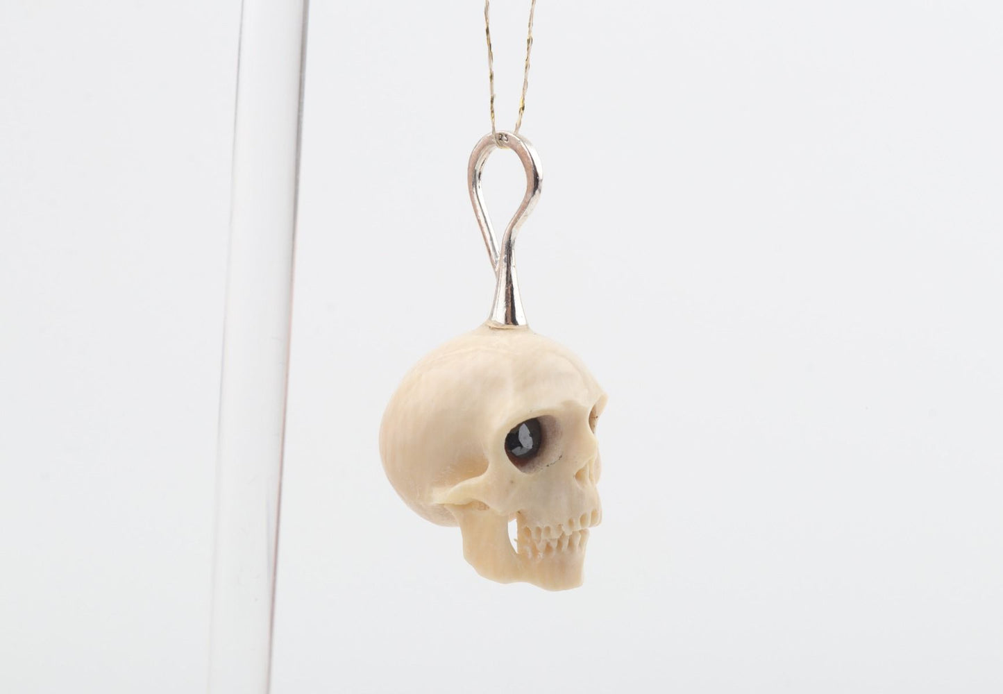 Festive Mammoth Ivory Skull Pendant
