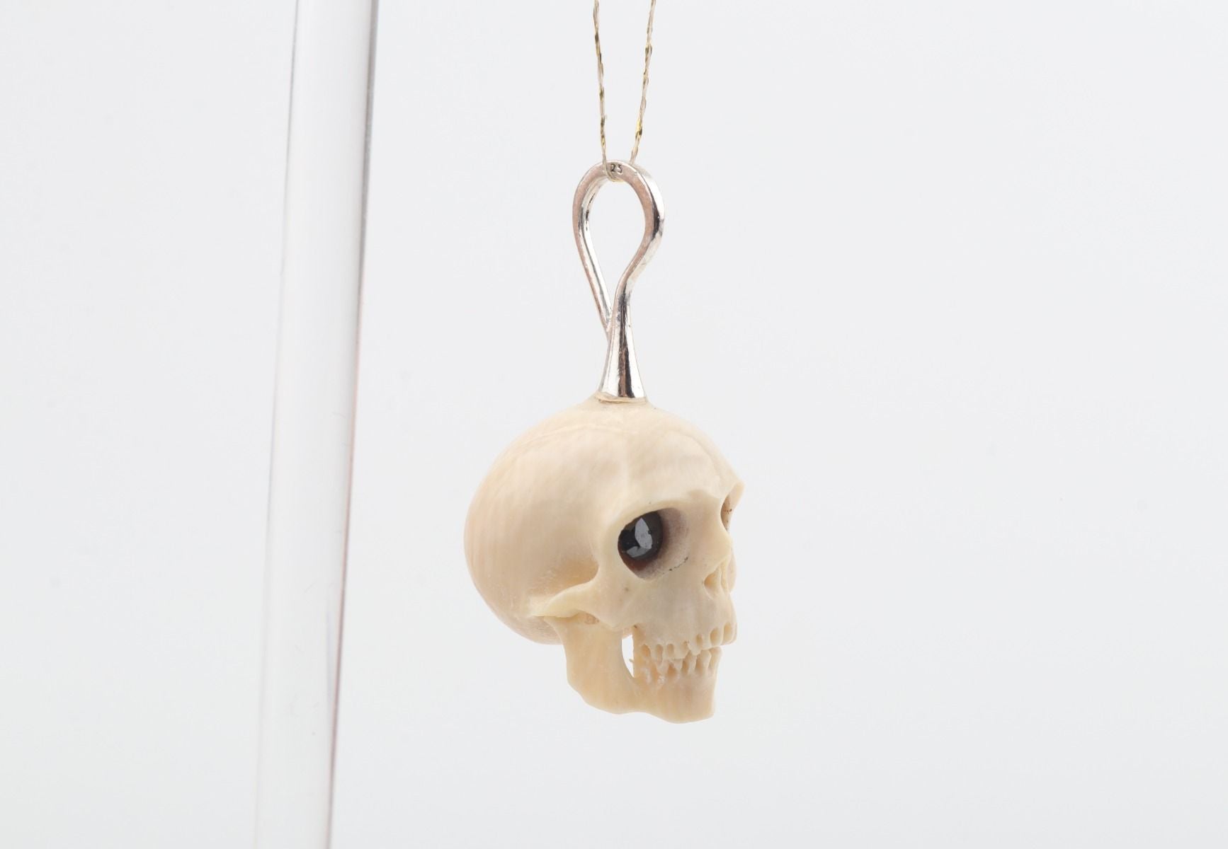 Festive Mammoth Ivory Skull Pendant