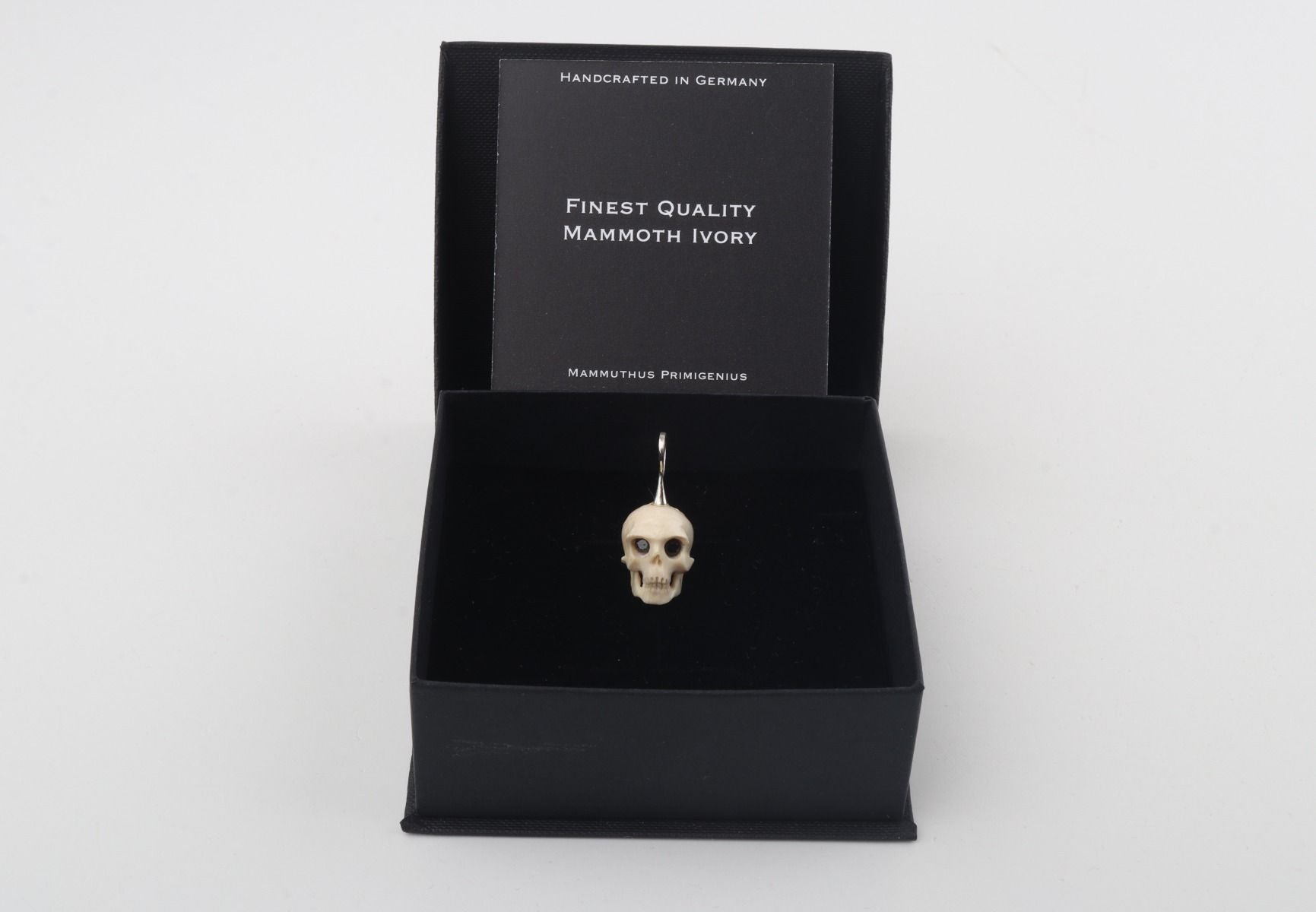 Festive Mammoth Ivory Skull Pendant