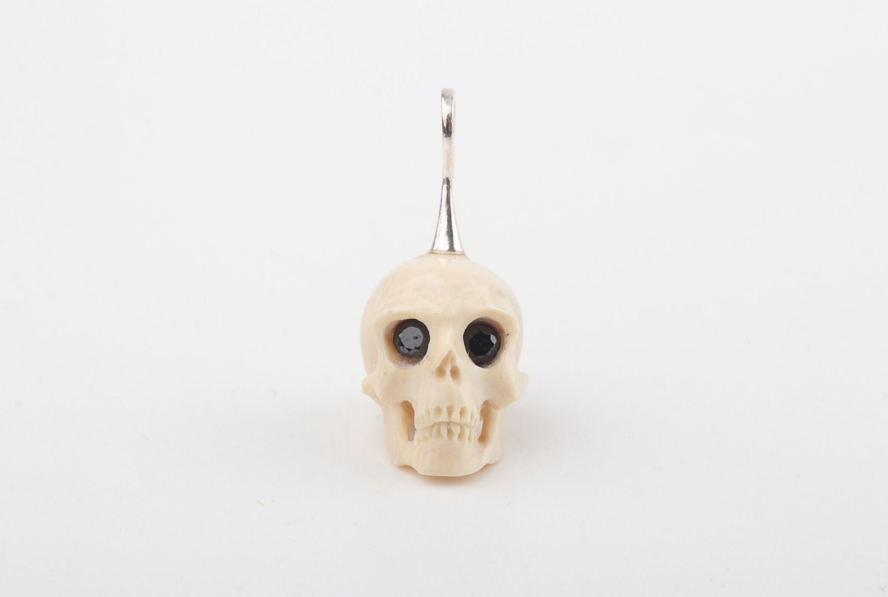 Festive Mammoth Ivory Skull Pendant
