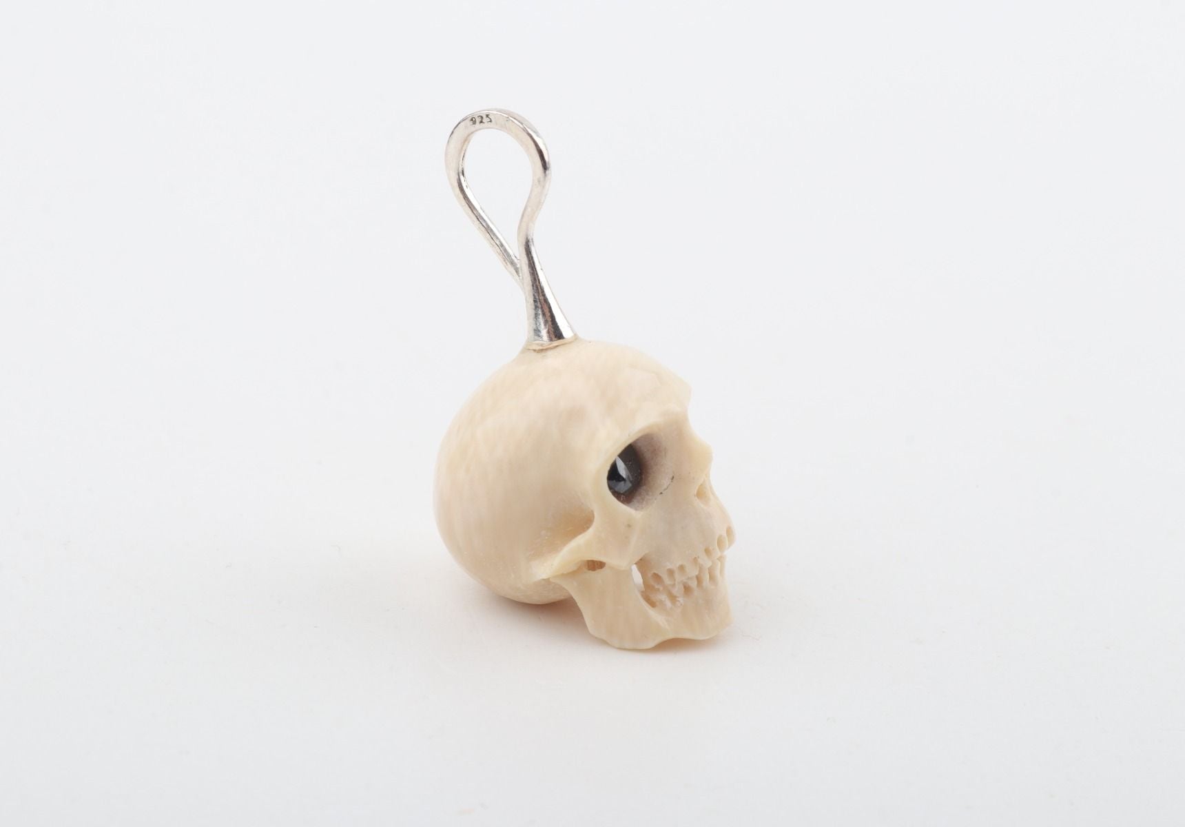 Festive Mammoth Ivory Skull Pendant