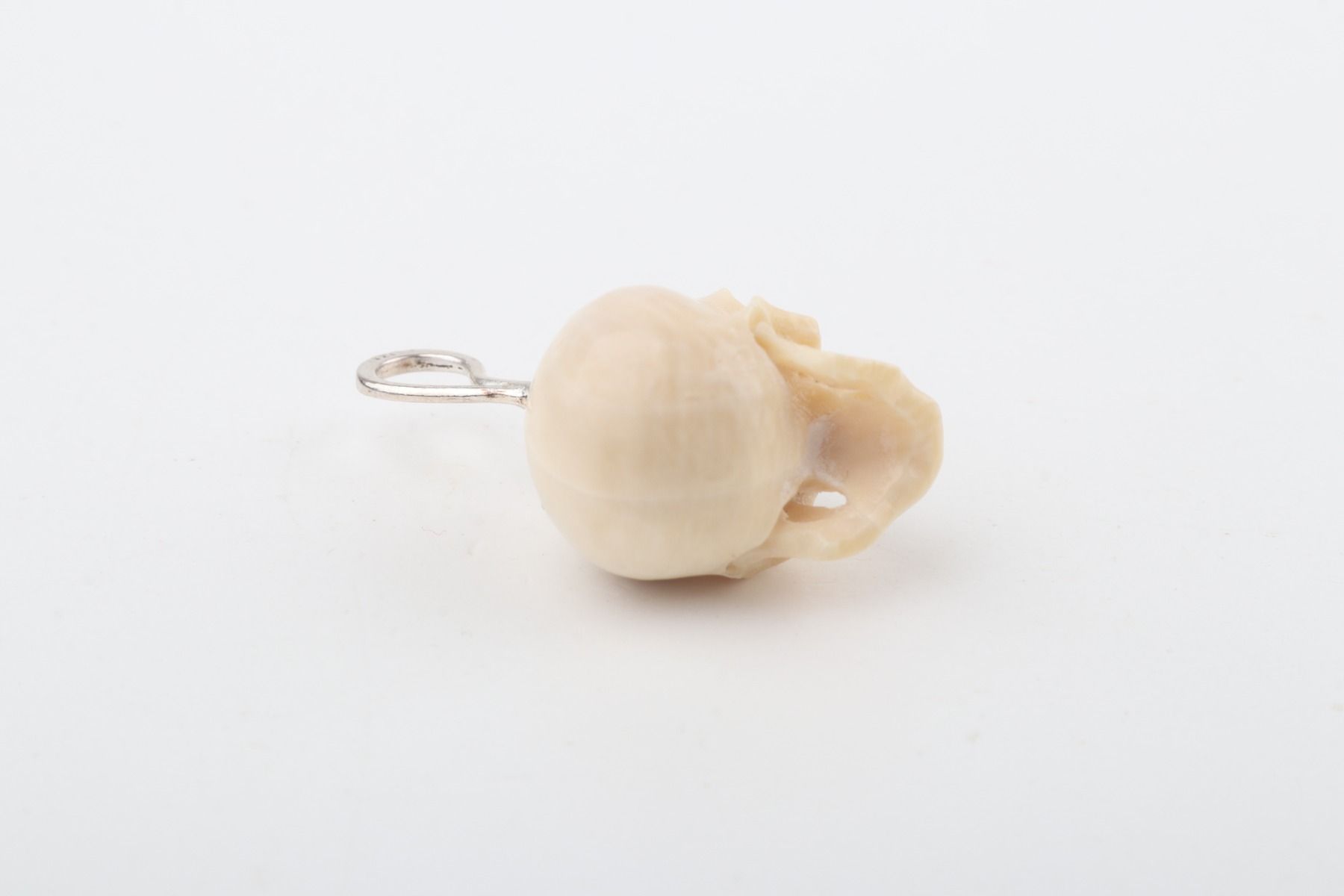 Festive Mammoth Ivory Skull Pendant