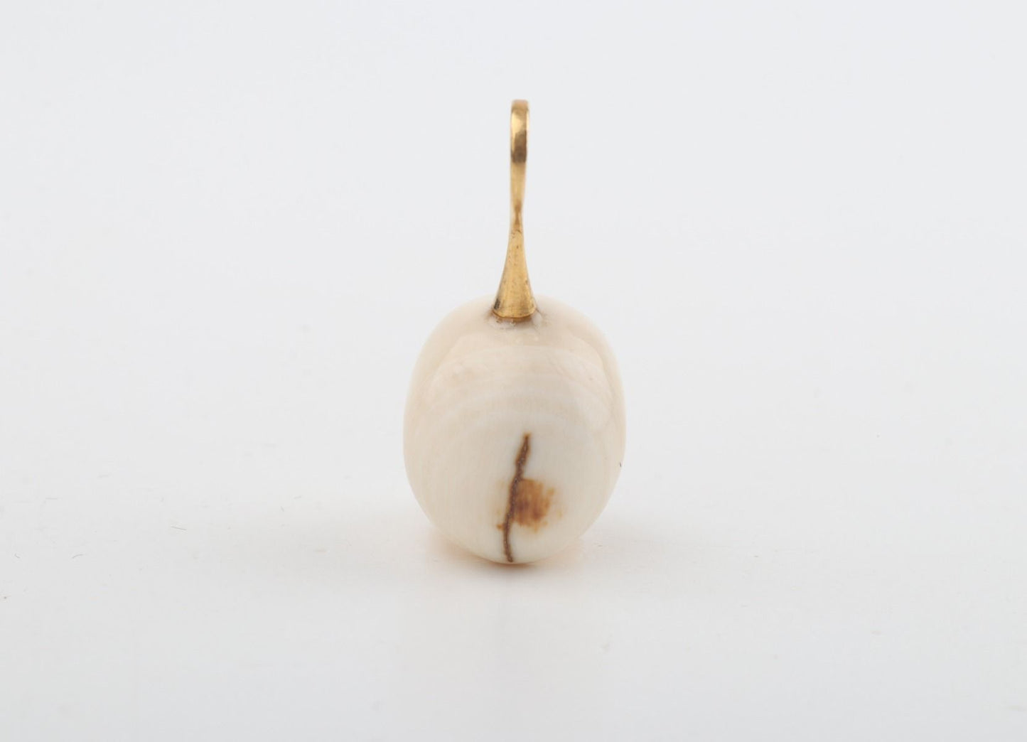 Festive Mammoth Ivory Skull Pendant
