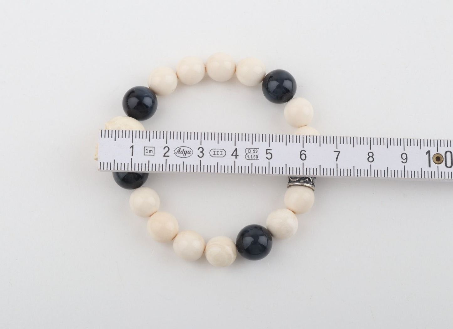 White Mammoth Skull & Flacon's Eye Bracelet