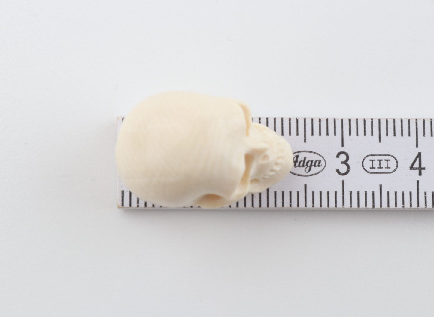 Hand carved mammoth ivory skull