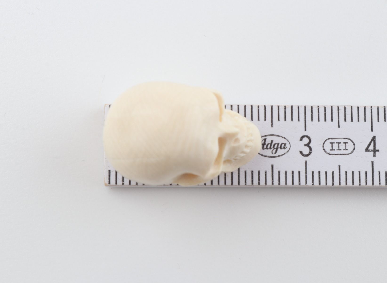 Hand carved mammoth ivory skull