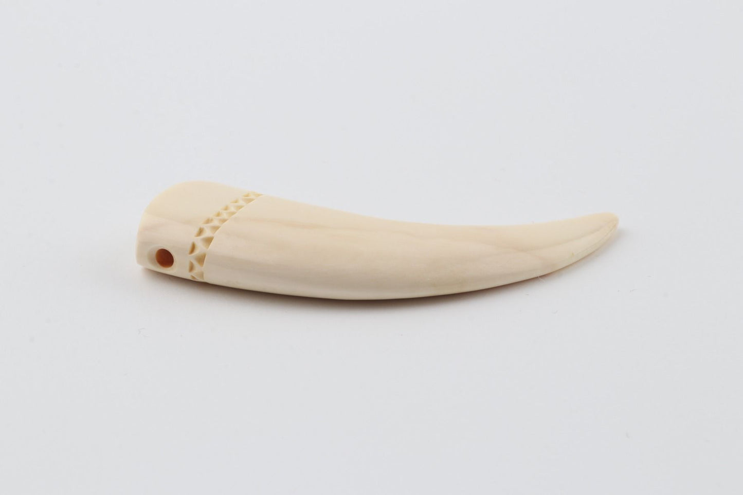 Carved mammoth ivory pendant