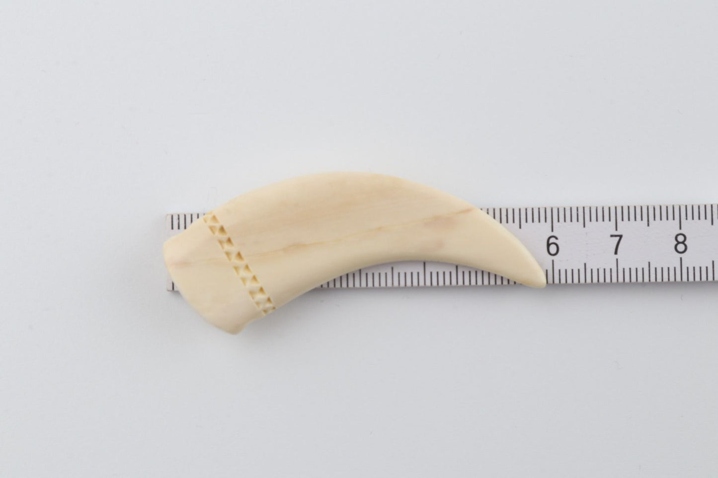 Carved mammoth ivory pendant