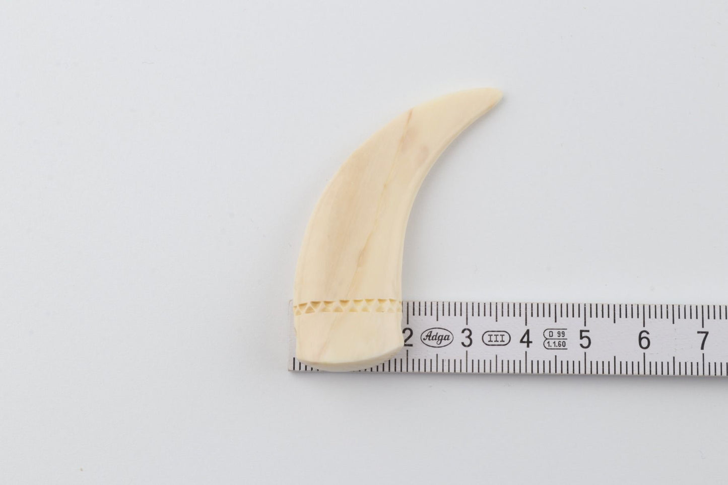 Carved mammoth ivory pendant