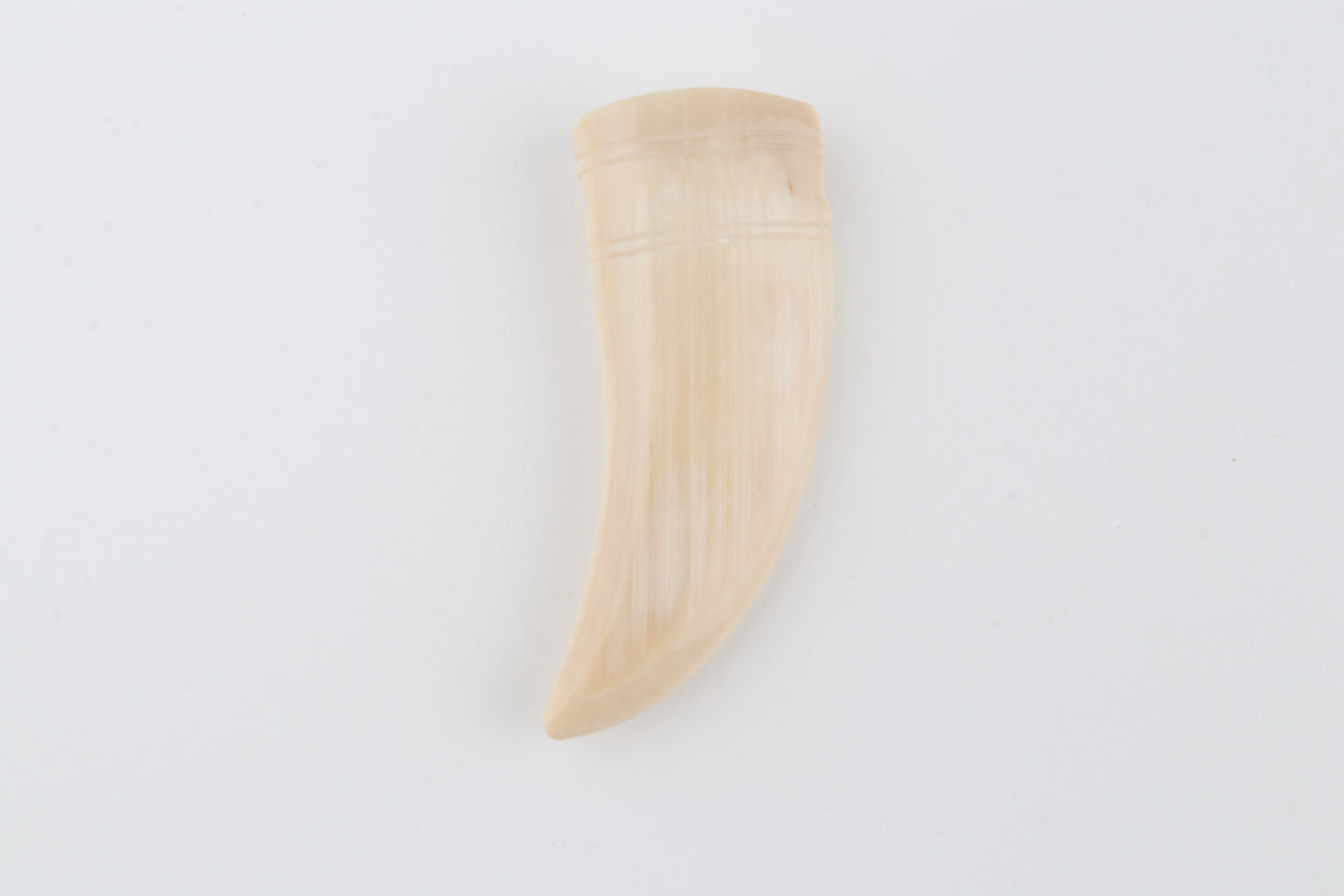 Carved mammoth ivory pendant