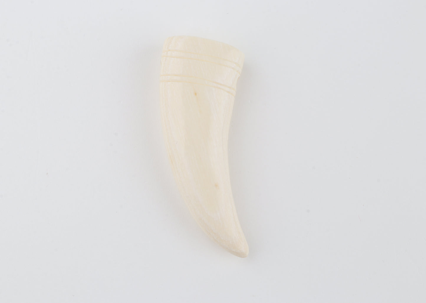 Carved mammoth ivory pendant