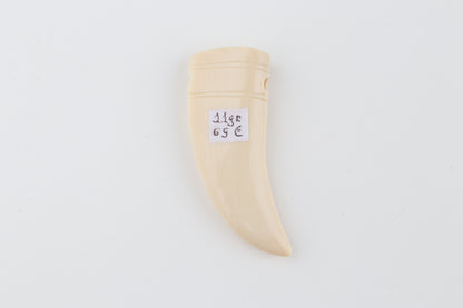 Carved mammoth ivory pendant