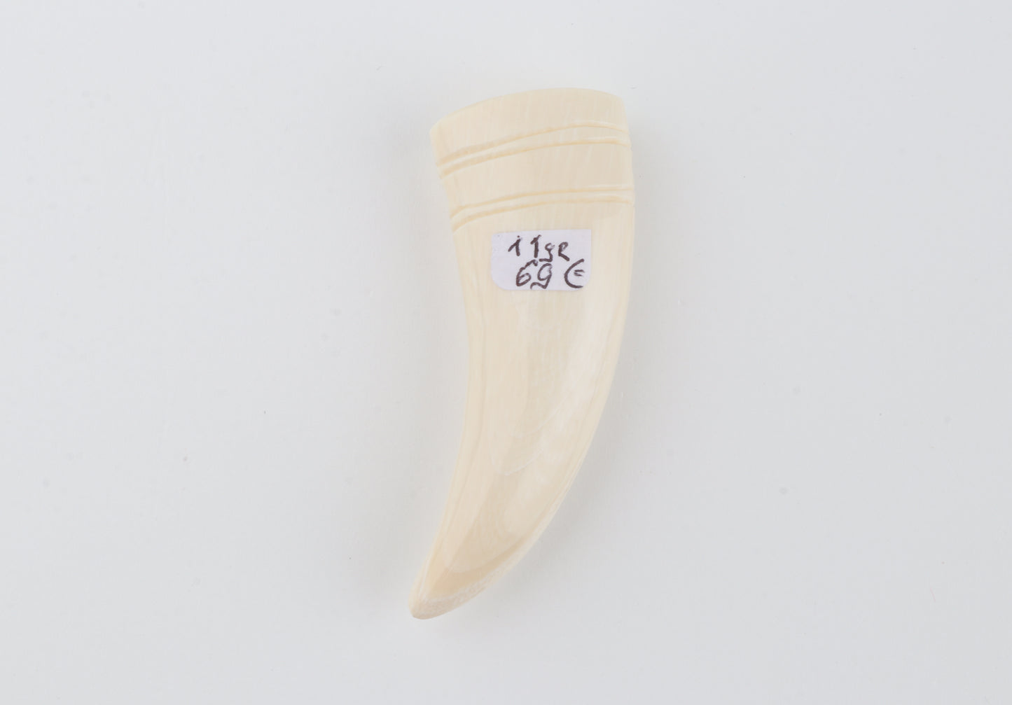 Carved mammoth ivory pendant