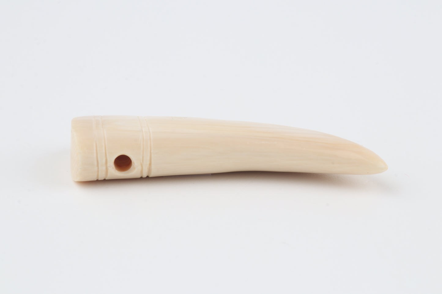 Carved mammoth ivory pendant