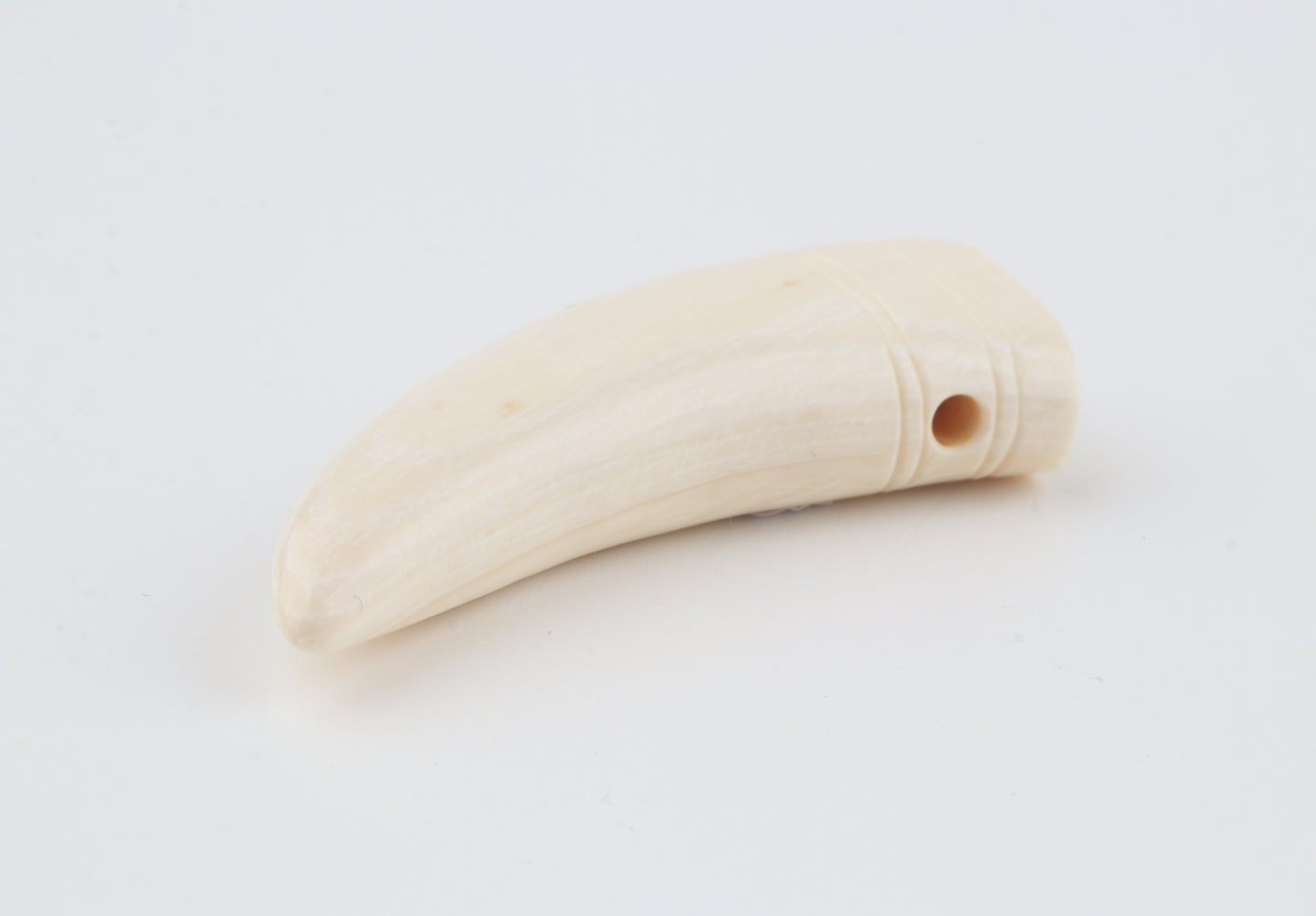 Carved mammoth ivory pendant