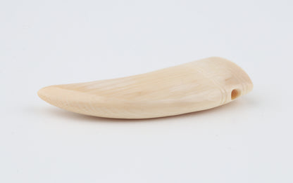 Carved mammoth ivory pendant