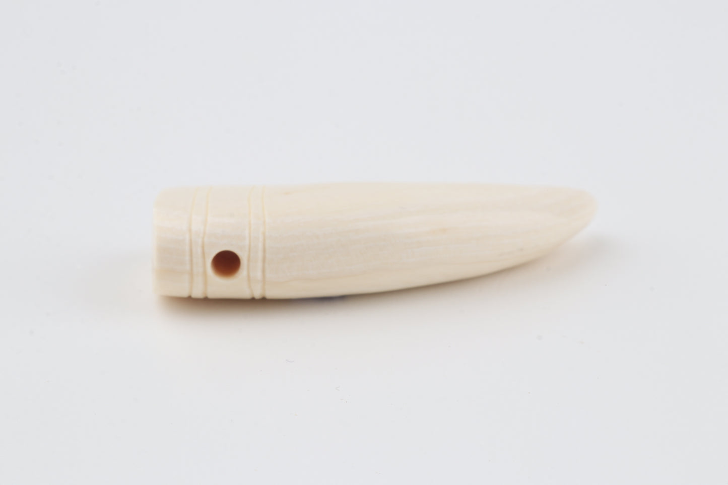 Carved mammoth ivory pendant
