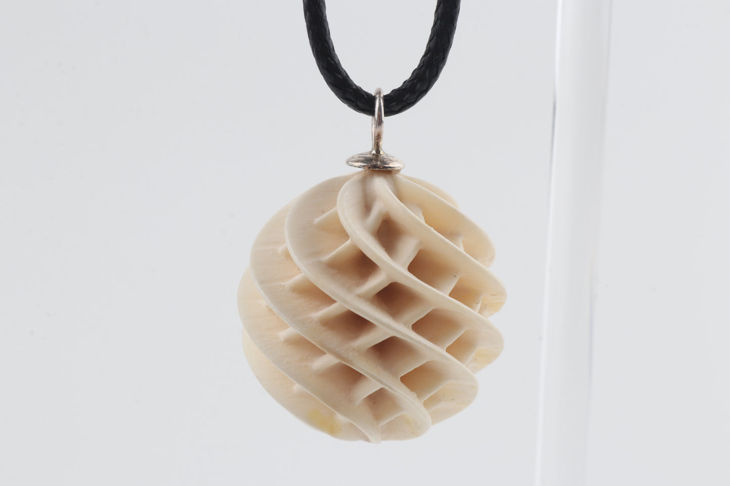 Carved Mammoth Ivory Spiral Sphere Pendant