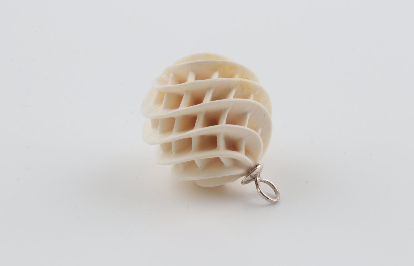 Carved Mammoth Ivory Spiral Sphere Pendant