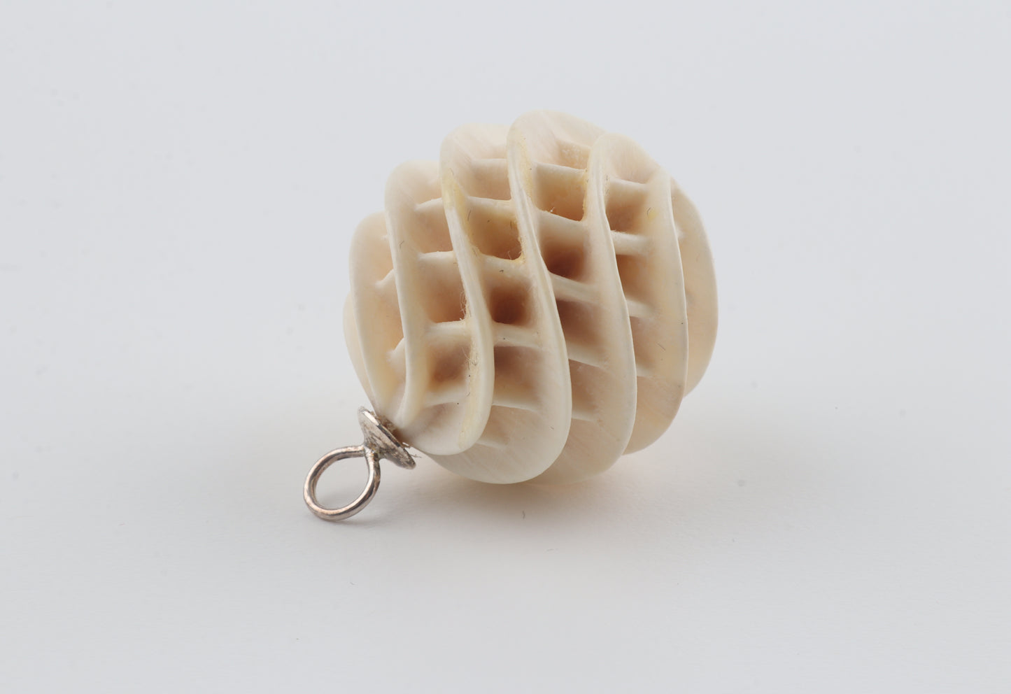 Carved Mammoth Ivory Spiral Sphere Pendant