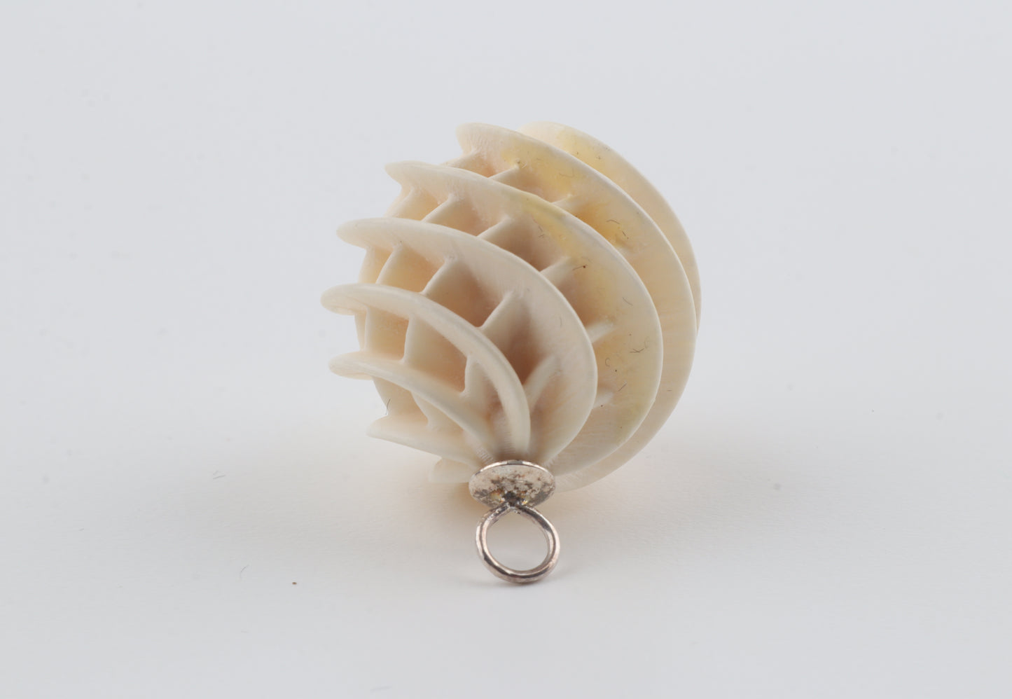 Carved Mammoth Ivory Spiral Sphere Pendant