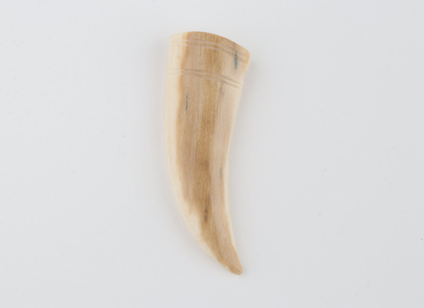 Carved mammoth ivory pendant
