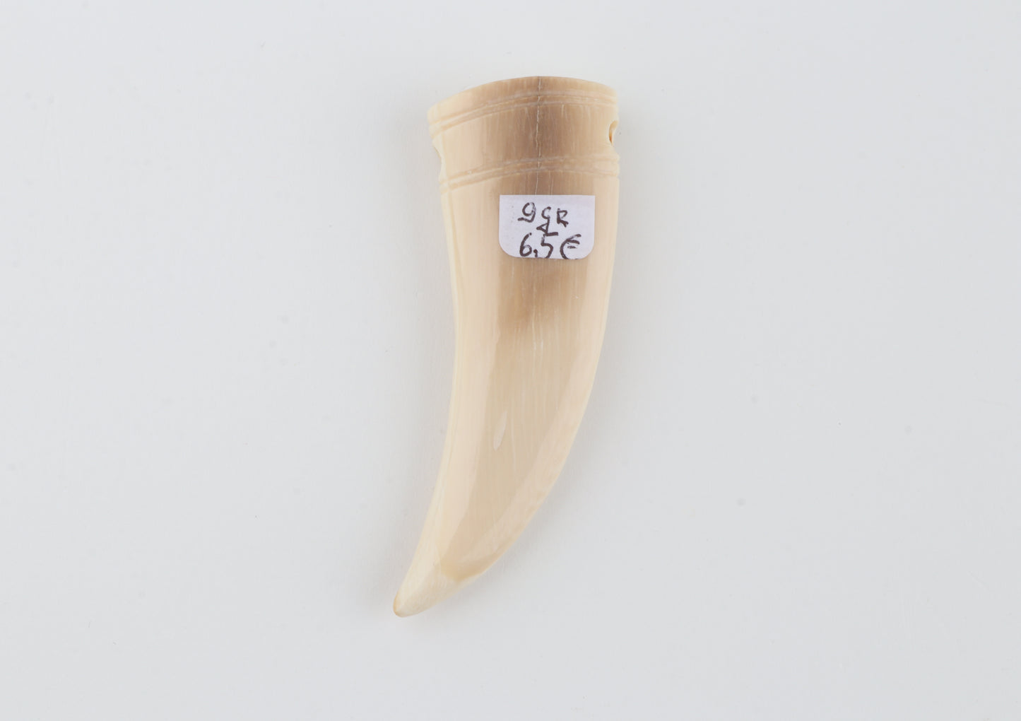 Carved mammoth ivory pendant