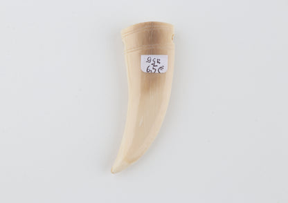 Carved mammoth ivory pendant