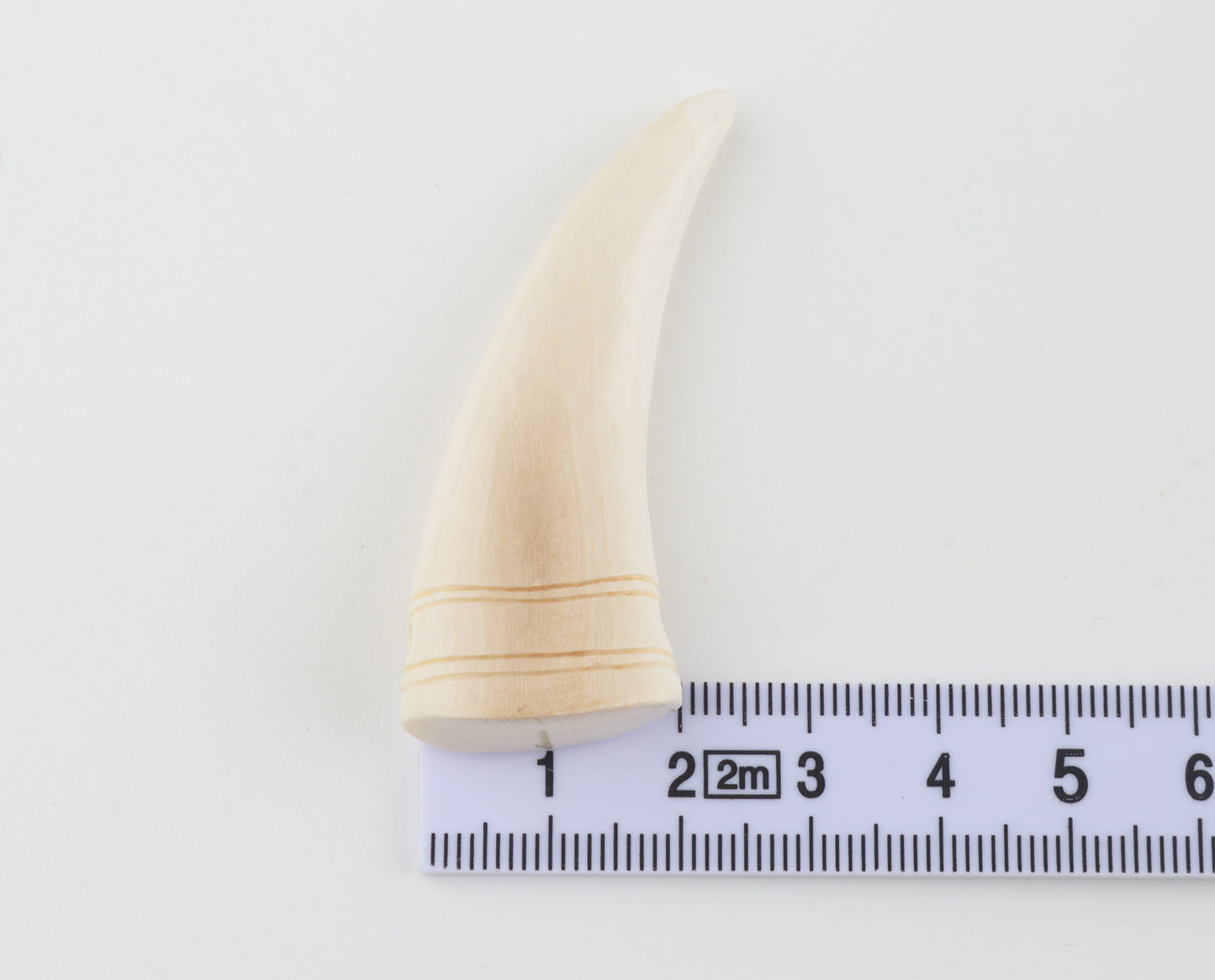 Carved mammoth ivory pendant