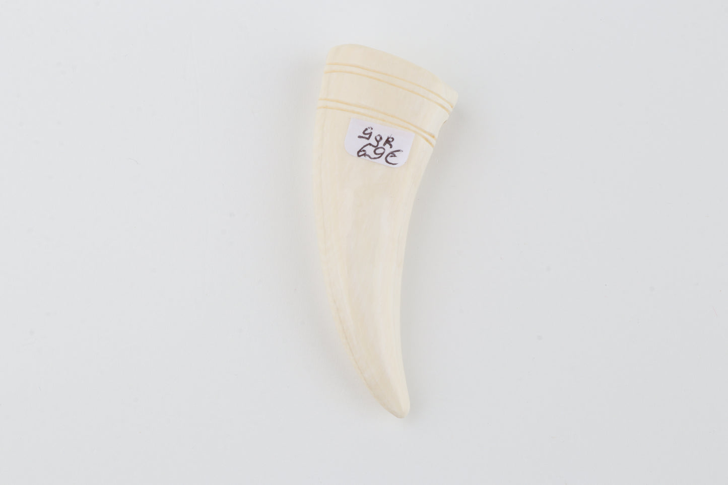 Carved mammoth ivory pendant