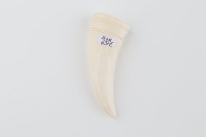 Carved mammoth ivory pendant