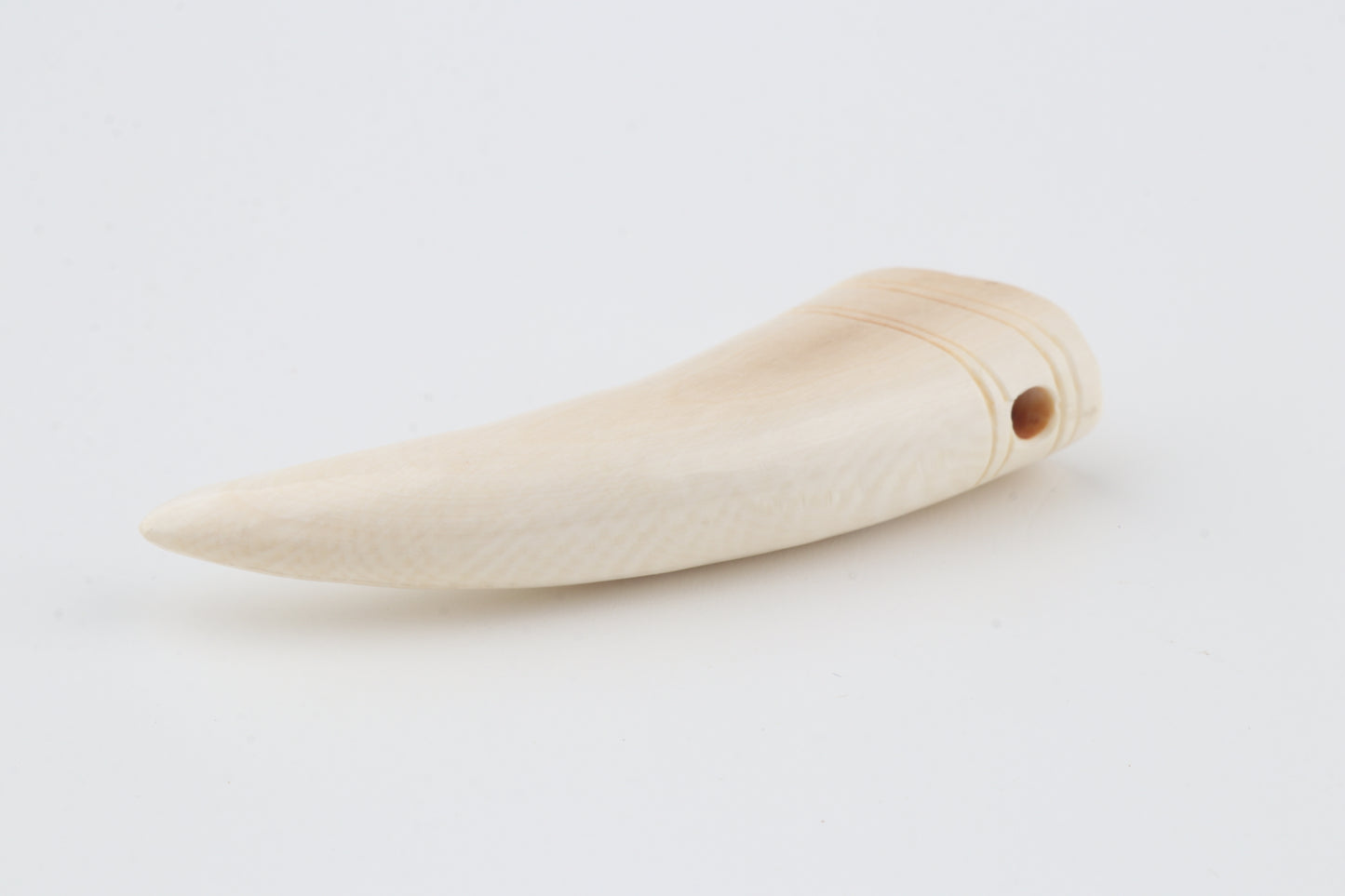 Carved mammoth ivory pendant