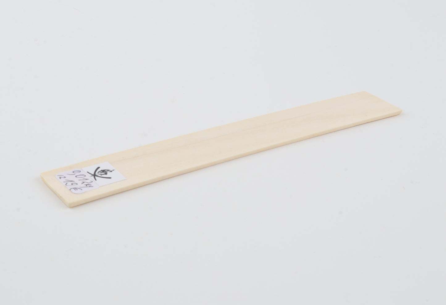 White mammoth ivory piece