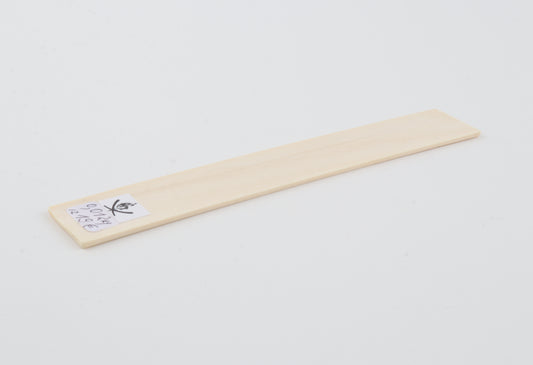 White mammoth ivory piece