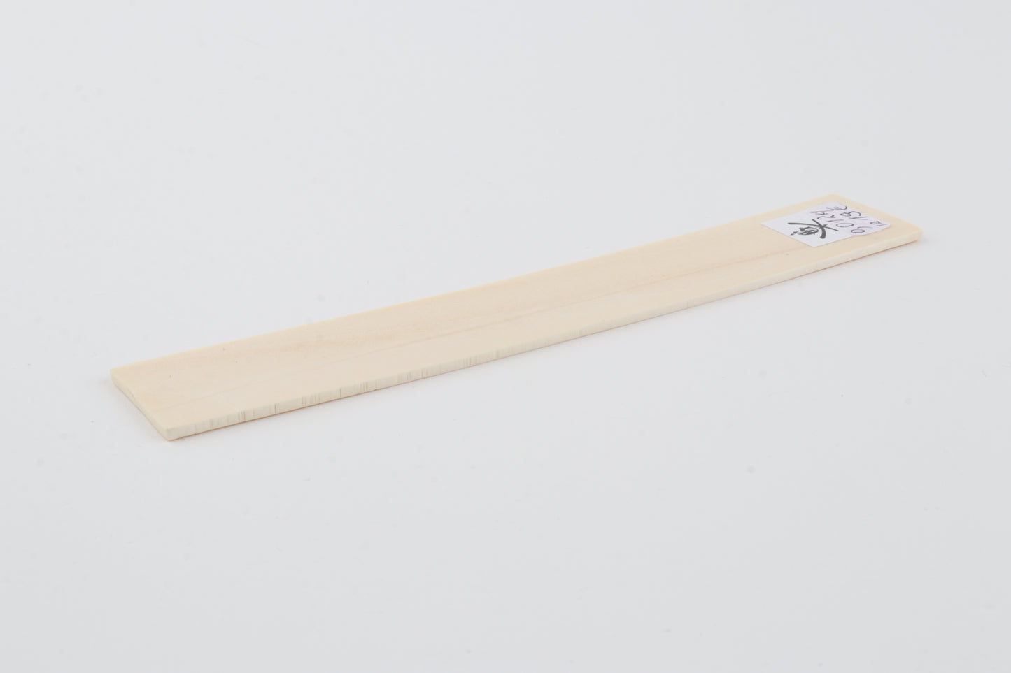 White mammoth ivory piece