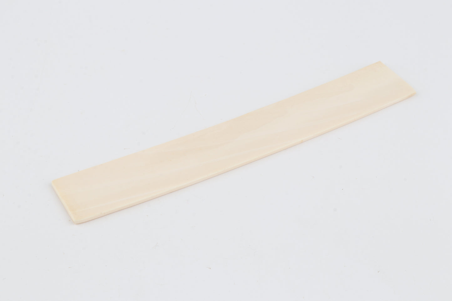 White mammoth ivory piece