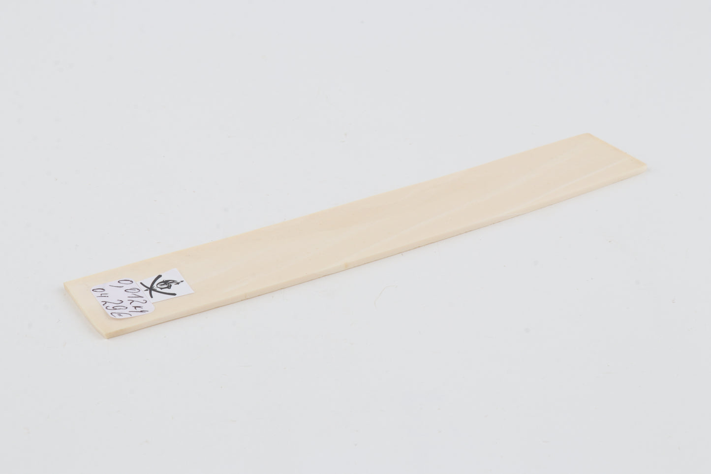 White mammoth ivory piece