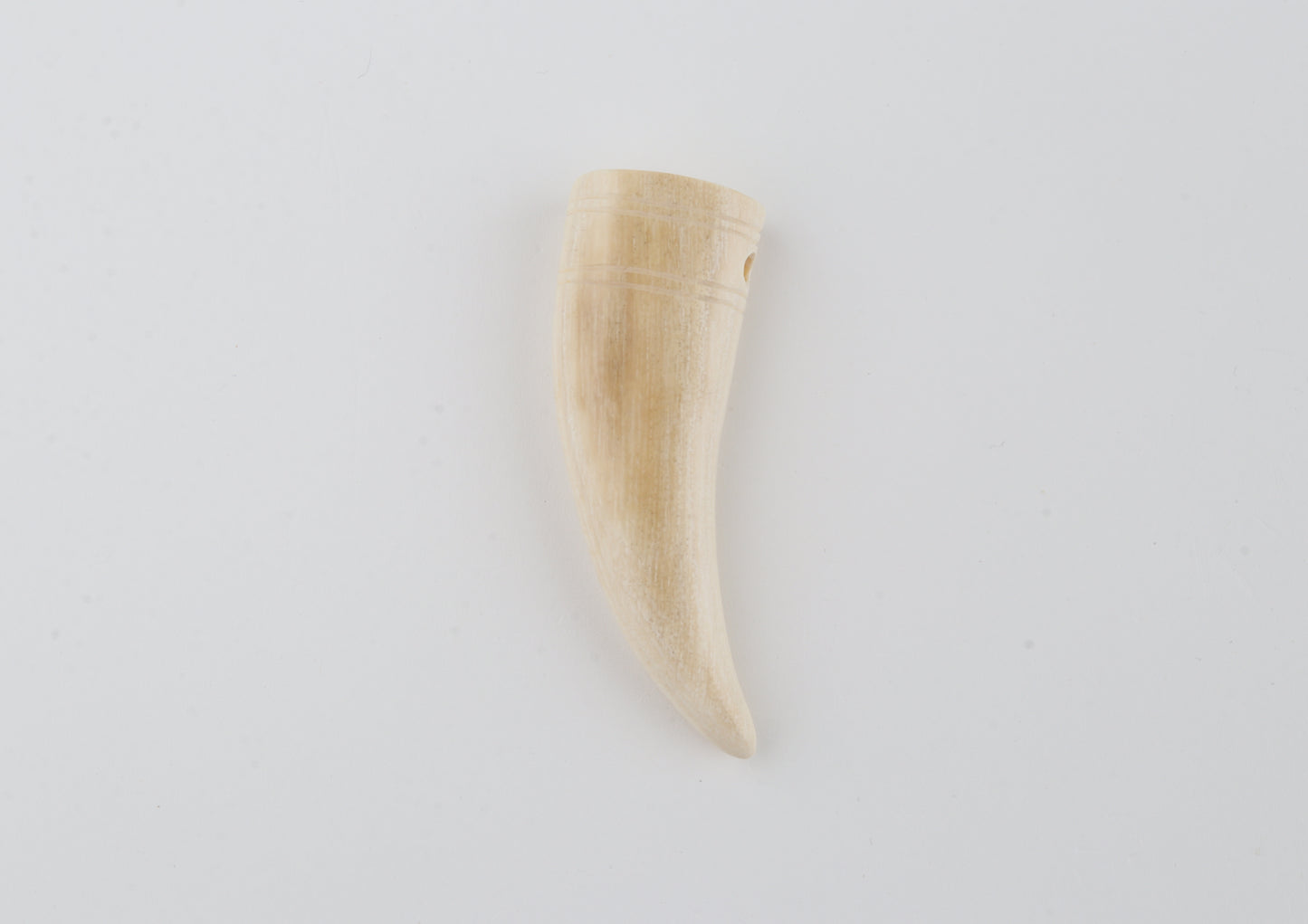 Carved mammoth ivory pendant