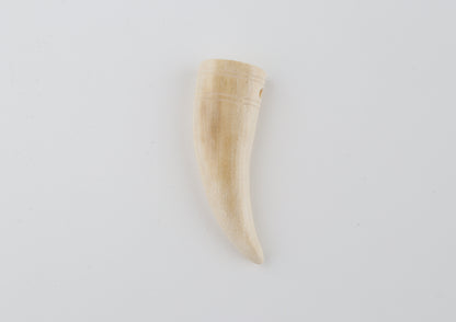Carved mammoth ivory pendant