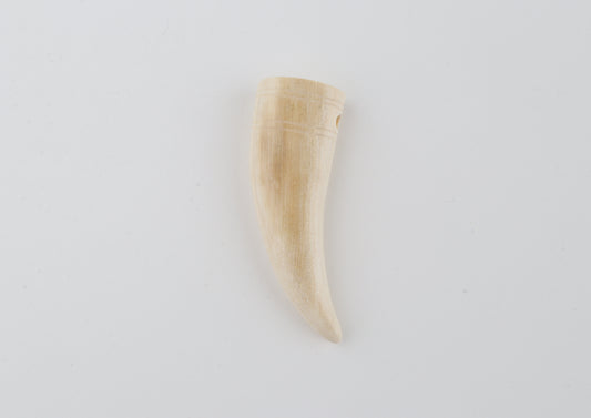 Carved mammoth ivory pendant