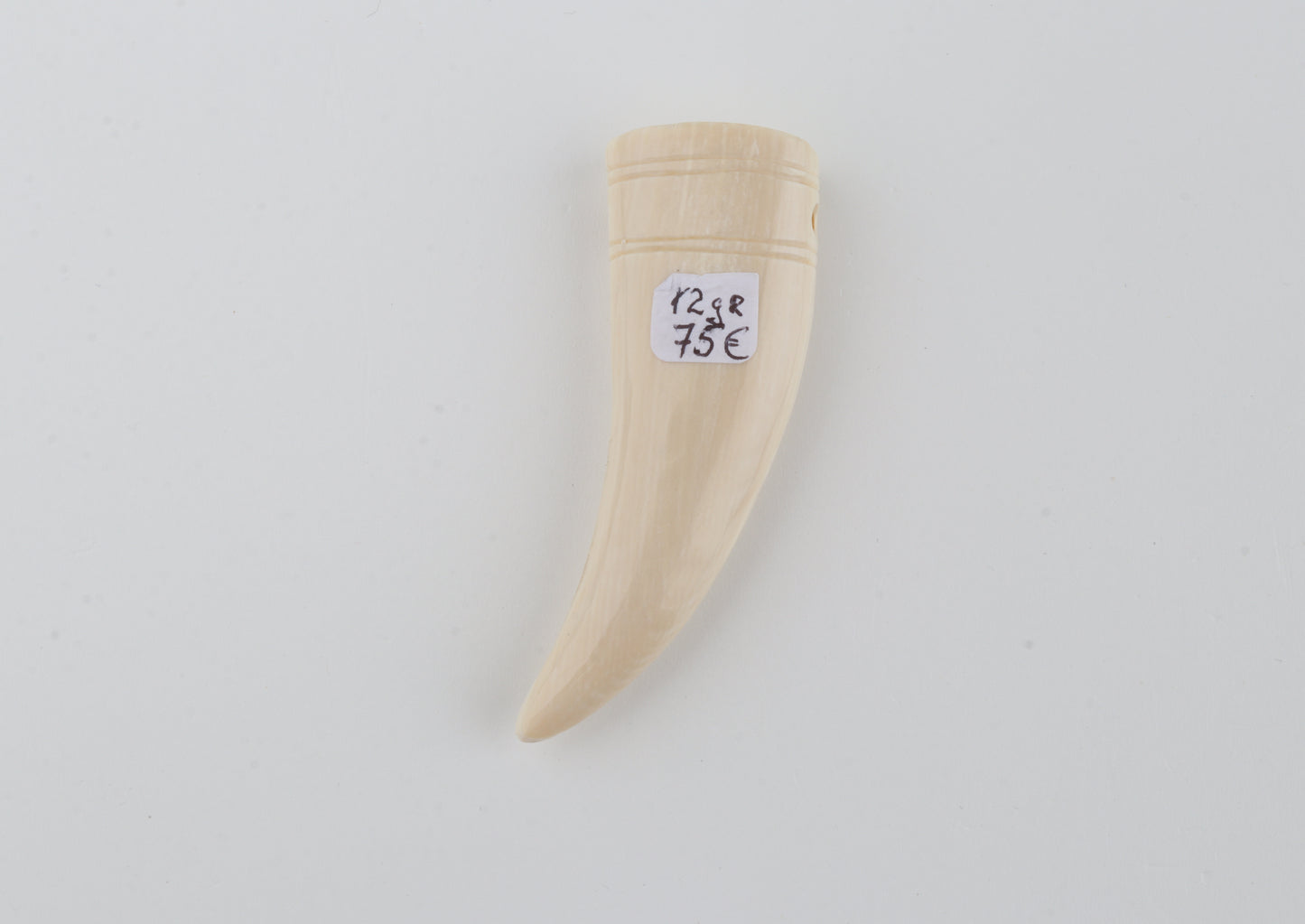 Carved mammoth ivory pendant