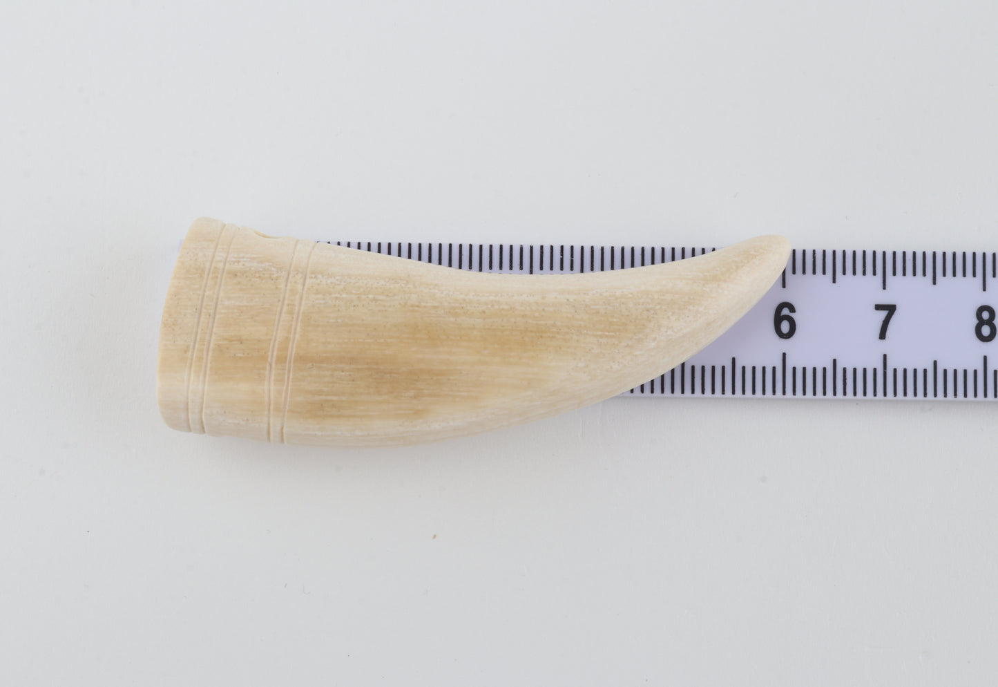 Carved mammoth ivory pendant